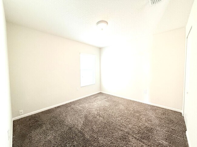 Building Photo - Spacious 4BR Home with Large Fenced Yard & Community Pool