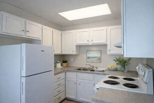 Updated Kitchen with Plenty of Drawer and Cabinet Space - Colonial Park Apartments
