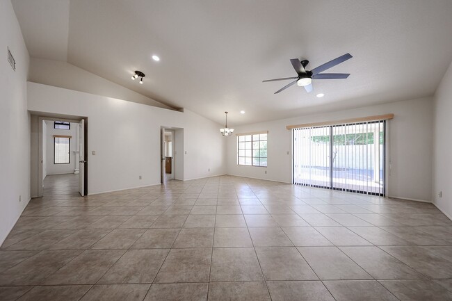 Building Photo - Welcome to this stunning 4-bedroom, 2-bath...