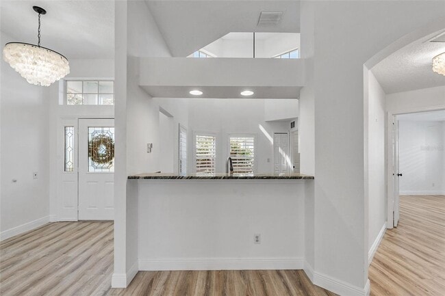 Building Photo - Stunning Custom Rental in Gated 55+ Royal ...
