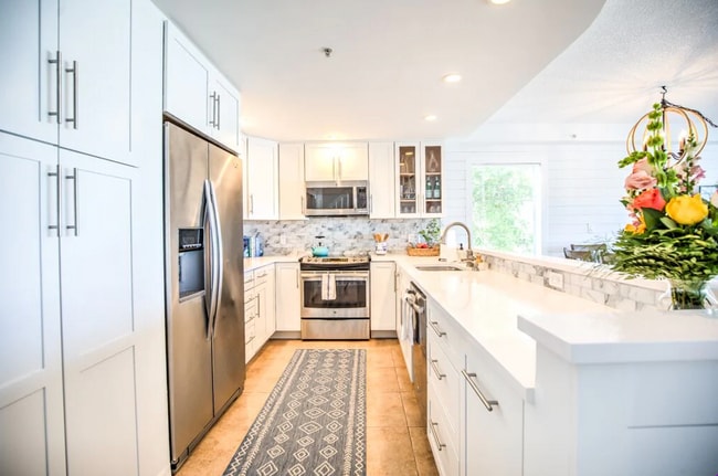 Double pantry, new fridge, dishwasher and garbage disposal. Kitchen is fully stocked - 96 Ave C