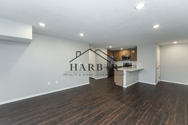 Building Photo - Brand NEW Caroline Apartments 201 -  Move ...