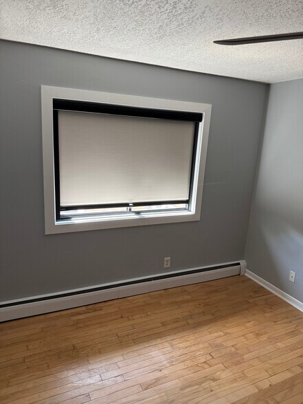 Primary BR with total blackout shade - 3019 Bryant Ave S