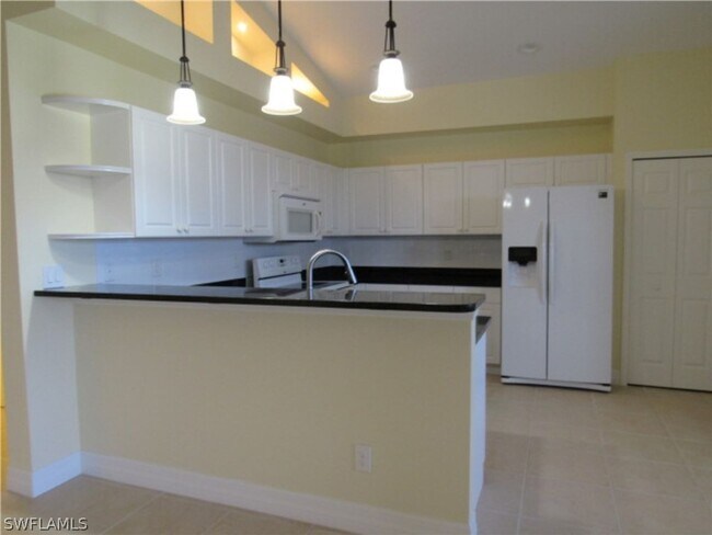 Building Photo - For Lease – Spacious 4-Bedroom Coach Home in Avalon Preserve