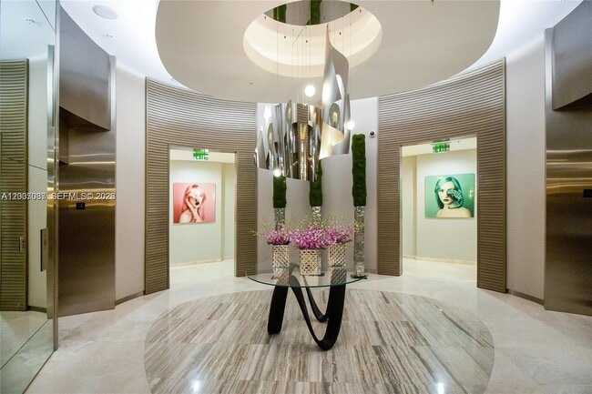 Building Photo - 10275 Collins Ave