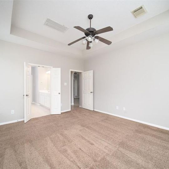 Master bedroom overlooking master bath - 2647 Katie Harbor Dr