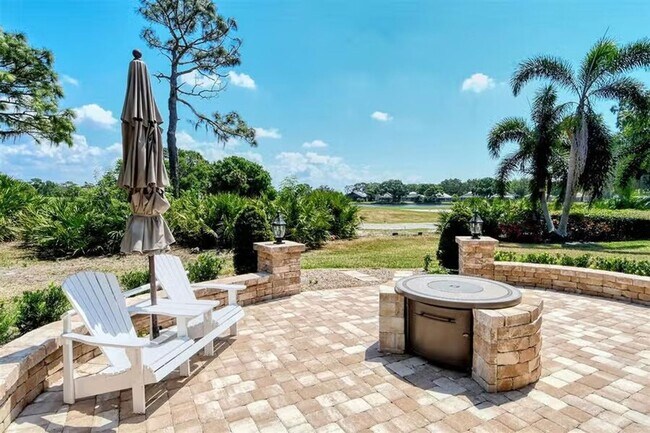 Building Photo - AVAILABLE JULY 1ST! Water & Golf Views in University Park Country Club with Pool and Spa!  3bed |...