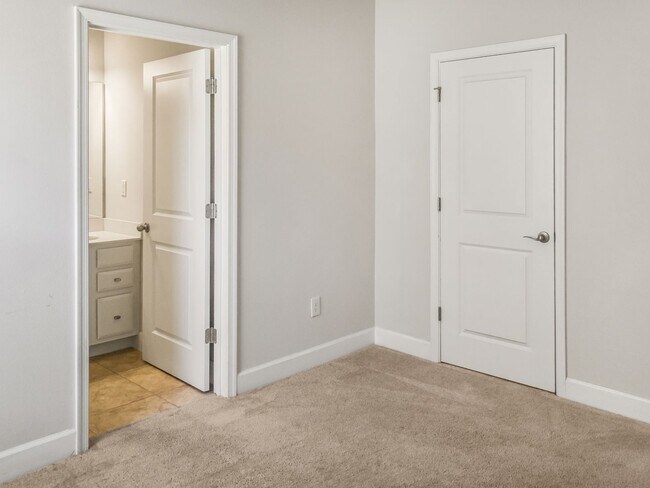 Building Photo - Open concept home offering four bedrooms, three baths, a two car garage and open lanai.