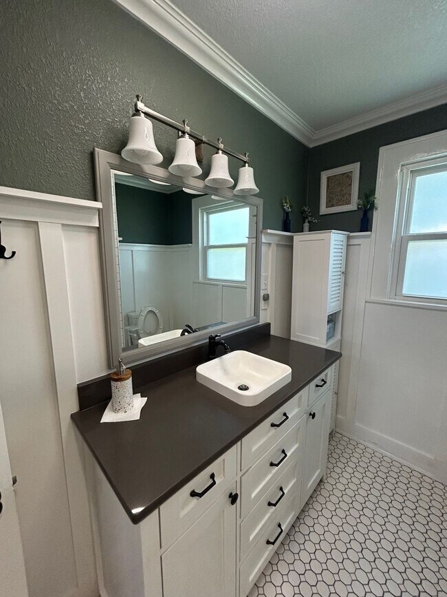 Building Photo - Spacious Corner Lot Charm