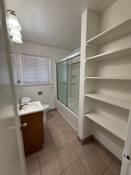 Bathroom with Tub and Storage - 317 Herma Ct