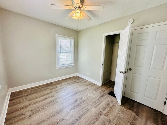 Building Photo - Updated two story home with unfinished bas...