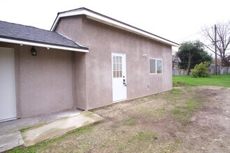 Building Photo - Perfect multi-family property! A 3-bed, 2-bath home for $2,400, plus a separate in-law studio ava...