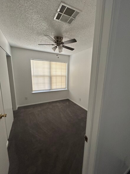 Bedroom with ceiling fan - 1345 Trudy Elaine Dr