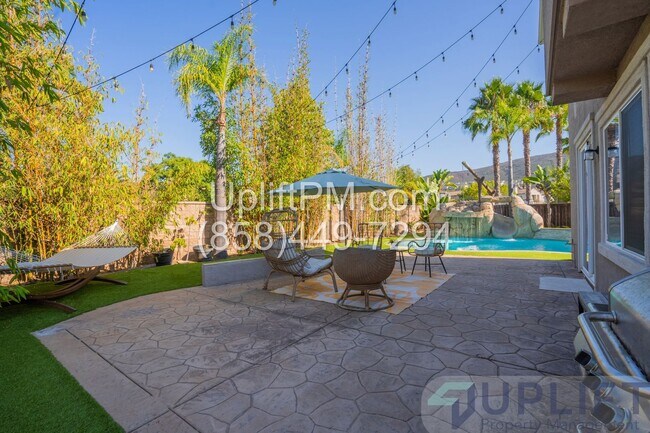 Building Photo - Spacious 5-Bedroom Home with Pool & Spa in...