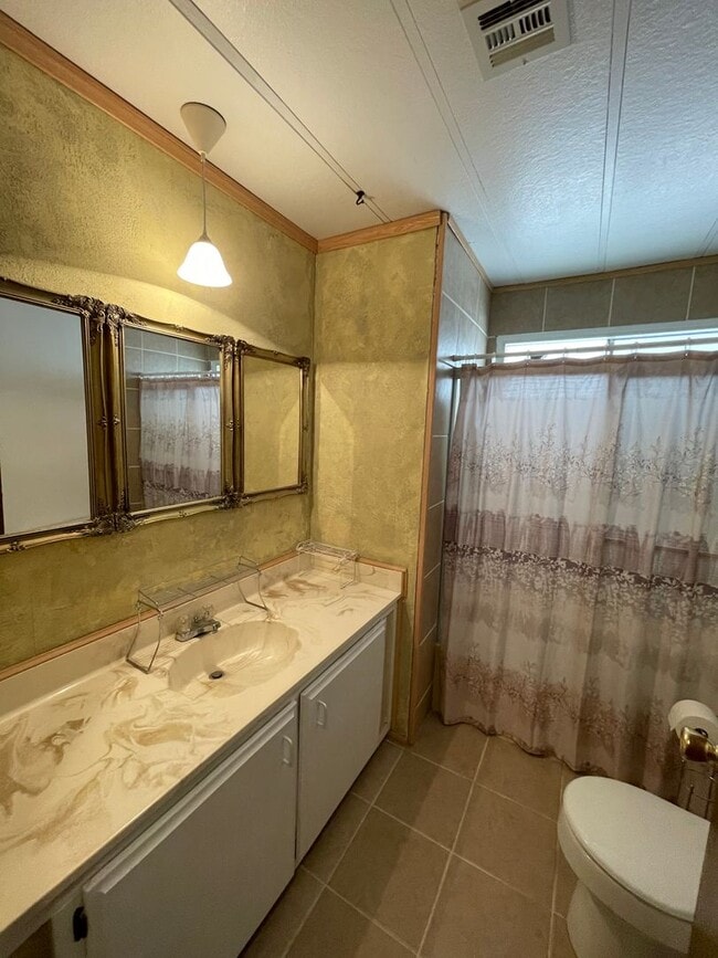 Building Photo - Partially Furnished Manufactured Home on its own Large Corner Lot! *No HOA*