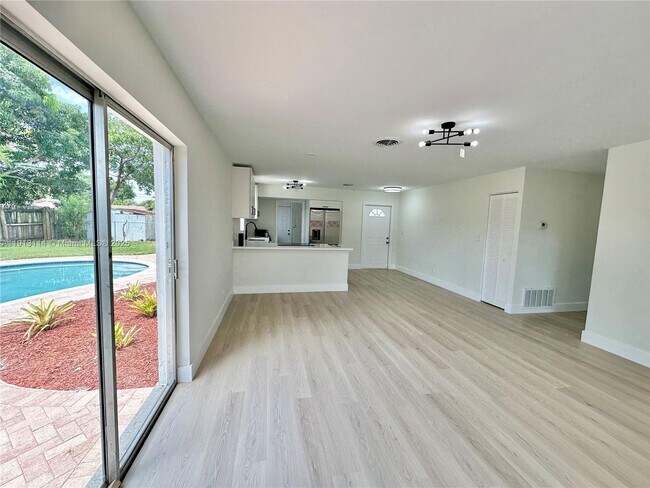 Building Photo - 6570 NW 6th Ct