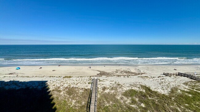Building Photo - Oceanfront 3 Bedroom 2 Bath Condo. Jacksonville Beach. Amenities. Private Beachfront Balcony w/ B...