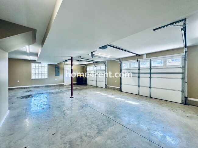 Building Photo - Charming Home Near Country Club Plaza w/ Gorgeous Updates, Wood Floors and a Two Car Garage!