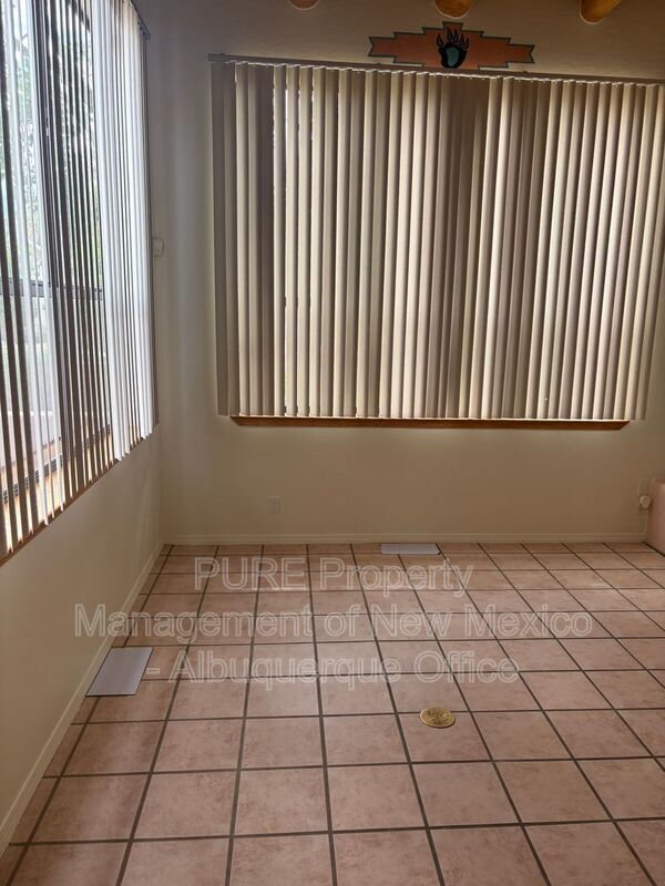 Building Photo - 8220 W Raintree Dr NE