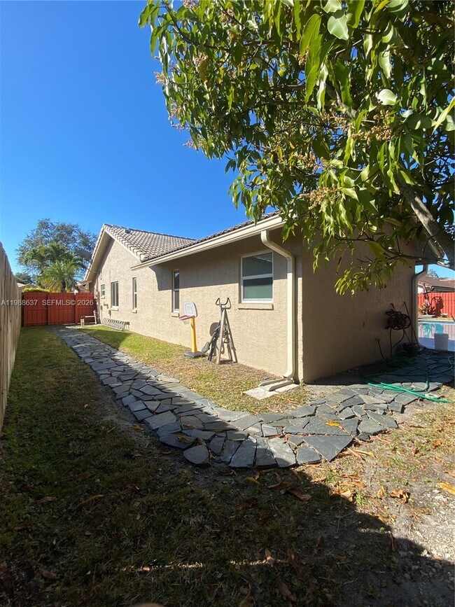 Building Photo - 10981 NW 7th St