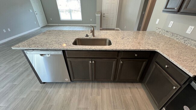 Building Photo - Smart & Stylish 3BD/2BA Palm Bay Home – Modern Upgrades, No Water Bills!