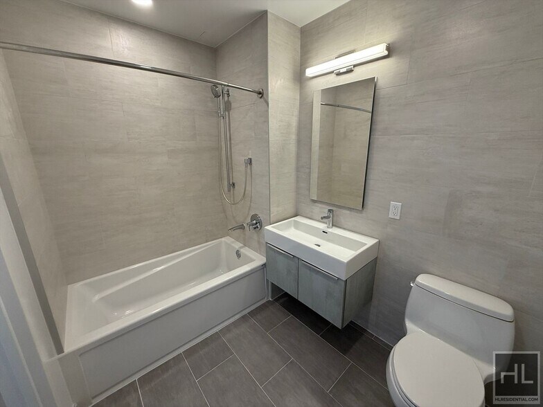 Building Photo - Northern Blvd | Flushing | 2BR/1BA w/Private Terrace, W/D & NO Broker's Fees!