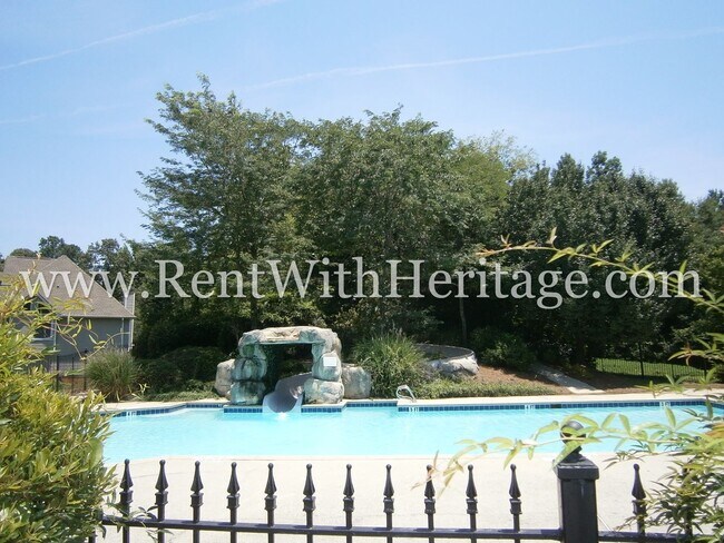 Building Photo - WOW!!...GORGEOUS HOME/HARDWOOD FLOORS/ UPGRADES GALLORE / SWIM - TENNIS