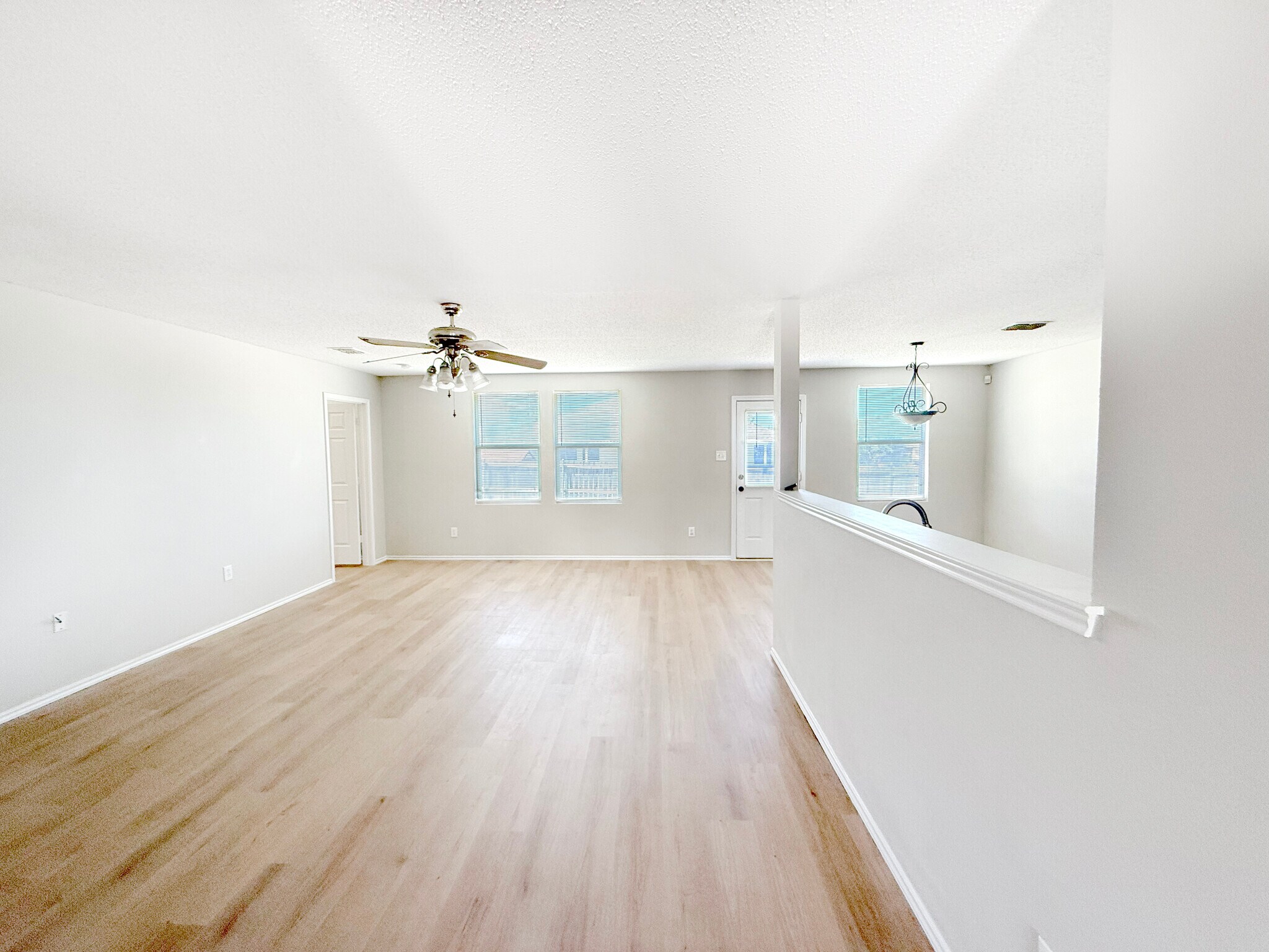 Living room looking to backyard. - 1419 Windy Meadows Dr