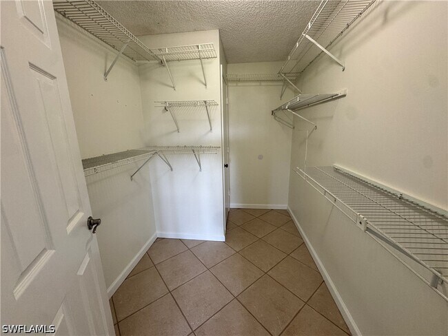 Building Photo - 12250 Tamiami Trl E