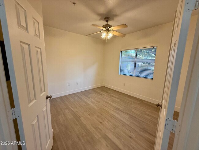 Building Photo - 9555 E Raintree Dr