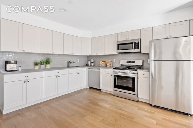 Building Photo - 26-20 14th Pl