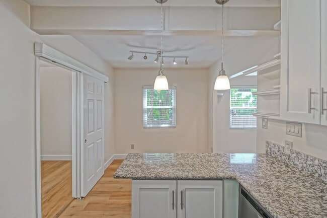 Building Photo - CHARMING, BRIGHT & AIRY HOME (THE MIDDLE OF 3 DETACHED HOUSES ON LOT) W/ 1-CAR GARAGE + DRIVEWAY ...