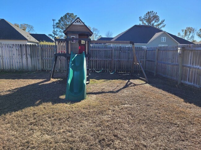 Building Photo - Spacious 4BR Home with Inground Pool, Open Split Floor Plan & Side-Entry Garage