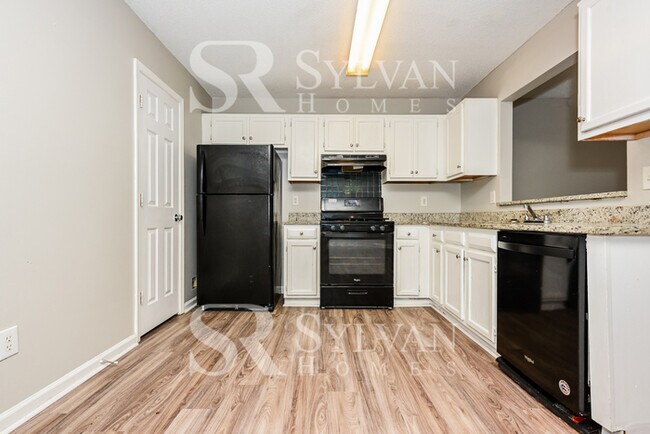 Building Photo - Turn the key. Enter. Smile. Repeat every day!