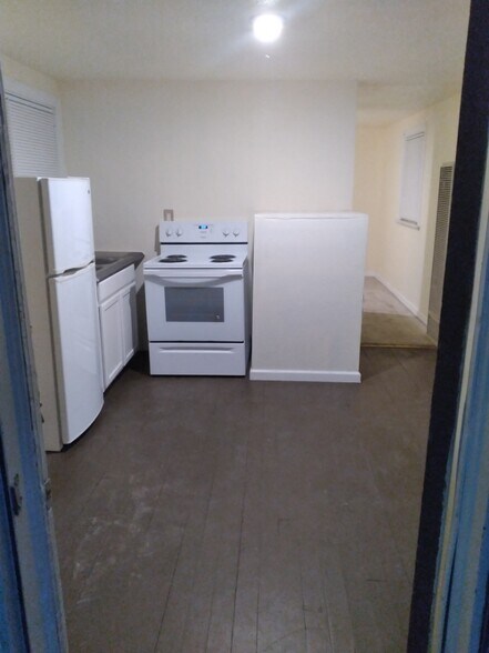 Brown wood floors -living room and kitchen - 1380 Dartmouth Ave