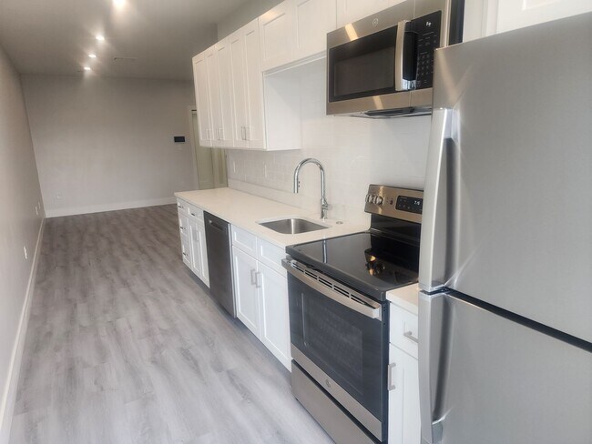 Building Photo - 2 BLOCKS FROM BEACHMONT TRAIN STATION CALL FOR COST DETAILS