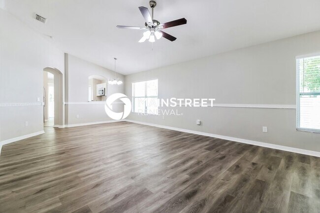 Building Photo - 4 Bedroom Pet-Friendly Home in land o lakes, FL with Main Street Renewal