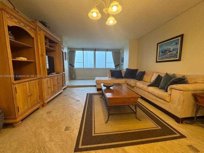 Building Photo - 5005 Collins Ave