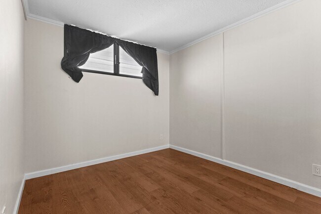 Building Photo - Wake Up to Stunning Mountain & Ala Wai Canal Views in the Heart of Waikiki