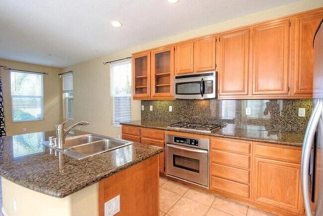 Building Photo - 13210 Petunia Avenue