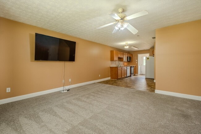 Building Photo - Spacious 4BR/3BA Townhome | Pet Friendly | Washer & Dryer Included | $1,600/mo