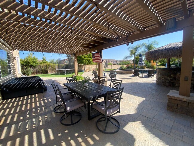 Building Photo - Spacious 5-Bedroom Luxury Home with Entertainer’s Backyard Oasis