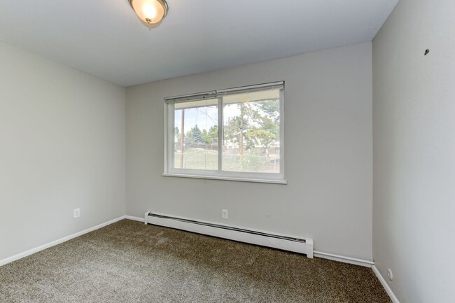 Building Photo - 8721 W 62nd Ave