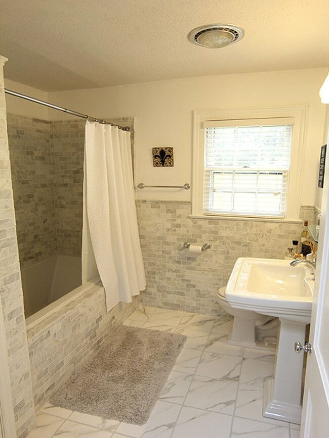 Building Photo - Adorable, Renovated Bungalow with Huge Yar...