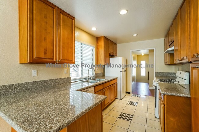 Building Photo - Bright & Airy 3BR West Covina Condo with Vaulted Ceilings, 2-Car Garage & Private Patio Spaces
