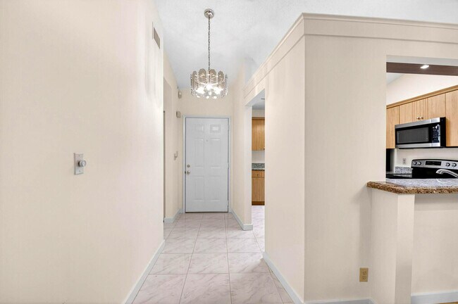 Building Photo - 10938 Roebelini Palm Ct