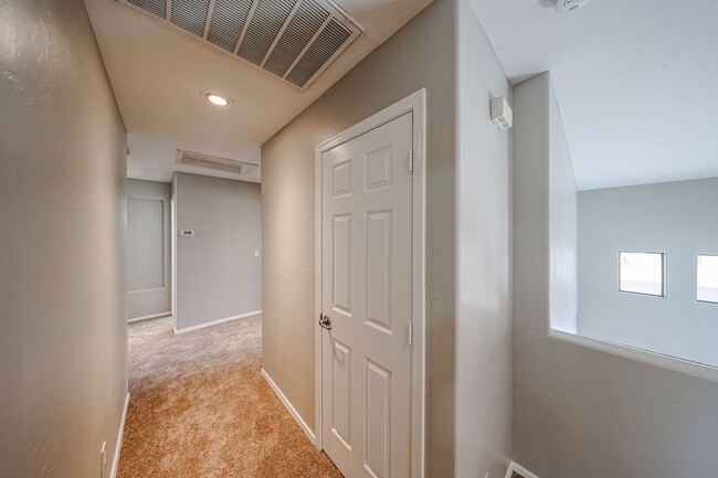 Building Photo - Welcome to this spacious 4 bedroom, 2.5 ba...