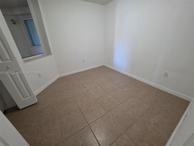 Building Photo - 10885 NW 89th Terrace