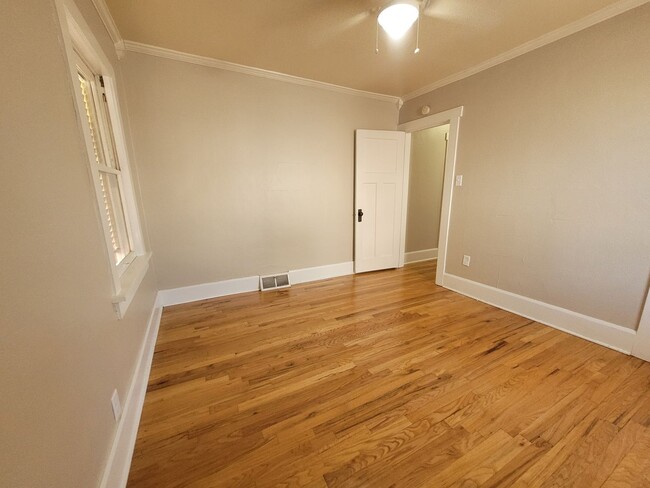 Building Photo - Two bedroom home, beautiful hardwood floors!