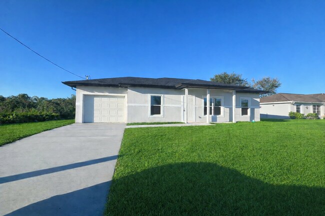 Building Photo - NEW CONSTRUCTION- Modern 3 Bed / 2 Bath Home in E Lehigh Acres